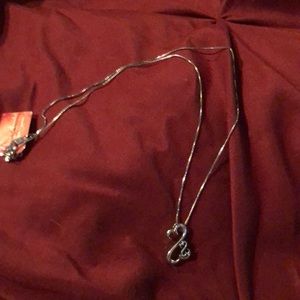 Jane Seymour’s Open Heart silver necklace.